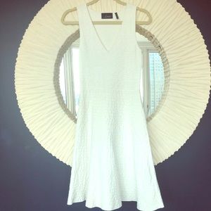 White sleeveless textured pattern dress